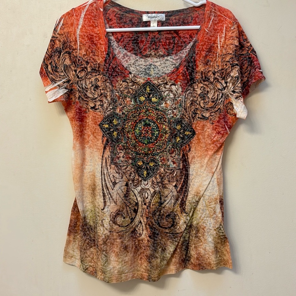Women’s top from Dressbarn. Excellent like new condition. Multi colored.